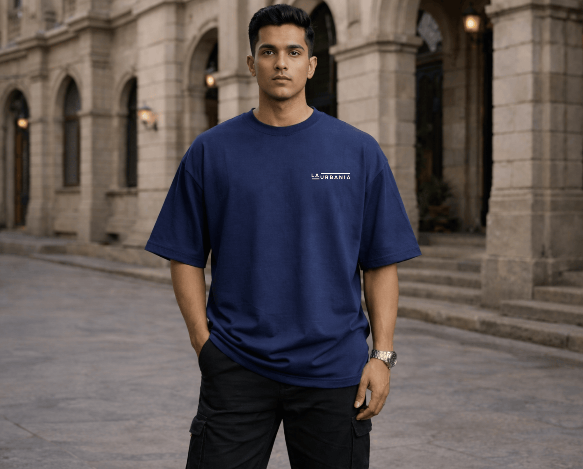 LaUrbania Imperial Blue oversized t-shirt model standing outside vintage building urban street