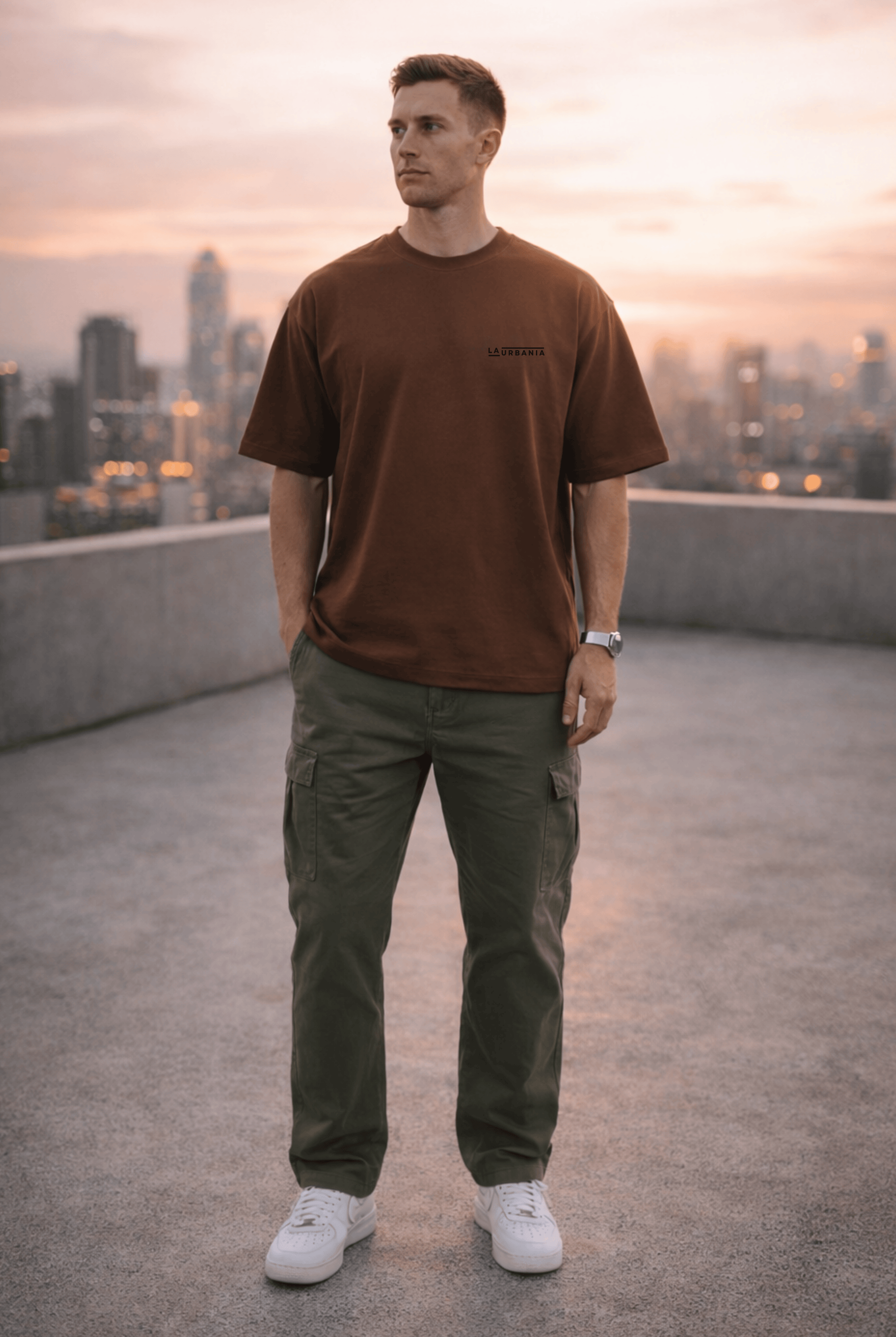 LaUrbania Mocha Mousse oversized t-shirt model standing rooftop terrace city landscape backdrop